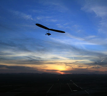 Hang glide at sunset